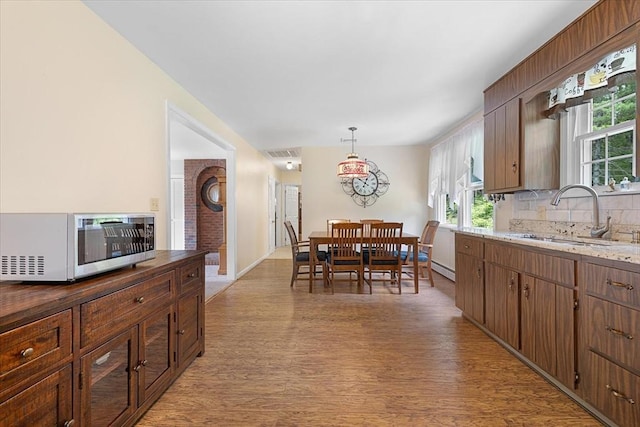 9 Treadwell Ter, Spencer, MA 01562 - dining space with light wood-style floors and baseboards