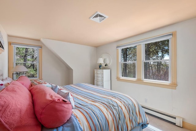 10 Lake Farm Ln, Orleans, MA 02653 - carpeted bedroom featuring a baseboard heating unit