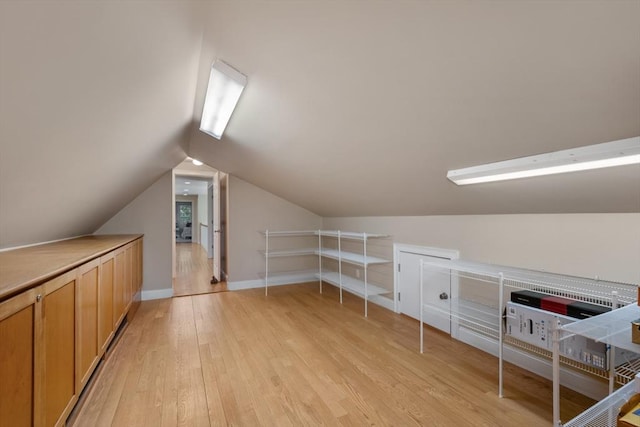 10 Lake Farm Ln, Orleans, MA 02653 - additional living space featuring light wood-style floors, vaulted ceiling, and baseboards