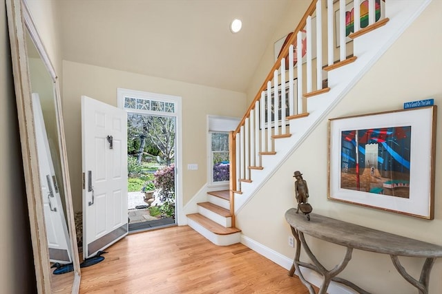 10 Lake Farm Ln, Orleans, MA 02653 - entrance foyer featuring light wood-style floors, stairs, baseboards, lofted ceiling, and recessed lighting