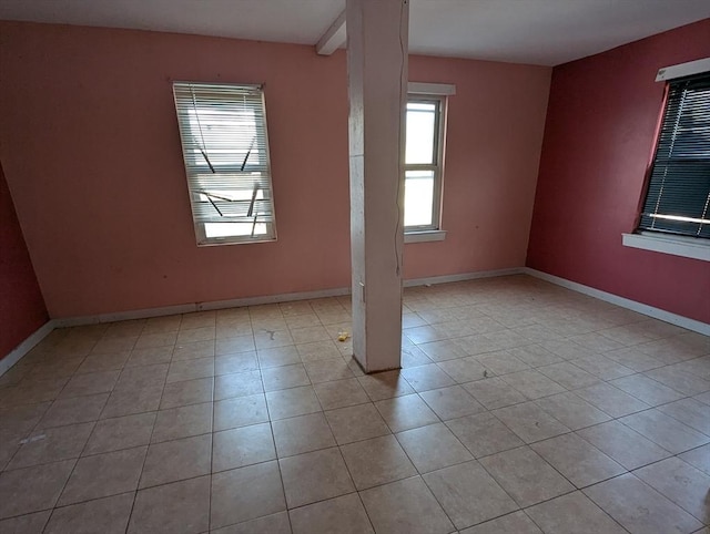 empty room with baseboards