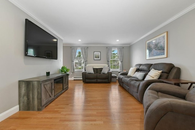 186 Mitchell G Dr, Tewksbury, MA 01876 - living area featuring light wood-type flooring, recessed lighting, crown molding, baseboards, and baseboard heating