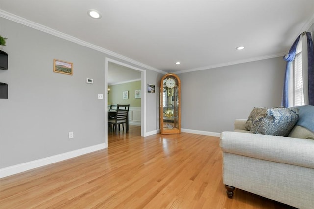 186 Mitchell G Dr, Tewksbury, MA 01876 - living area featuring light wood-type flooring, recessed lighting, ornamental molding, and baseboards
