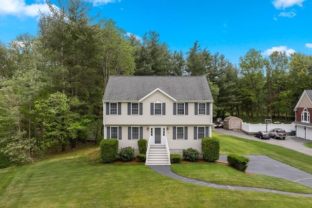 186 Mitchell G Dr, Tewksbury, MA 01876 - colonial-style house with a front lawn