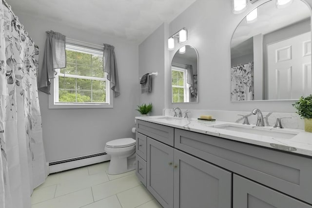 186 Mitchell G Dr, Tewksbury, MA 01876 - full bathroom with baseboard heating, double vanity, toilet, and tile patterned floors