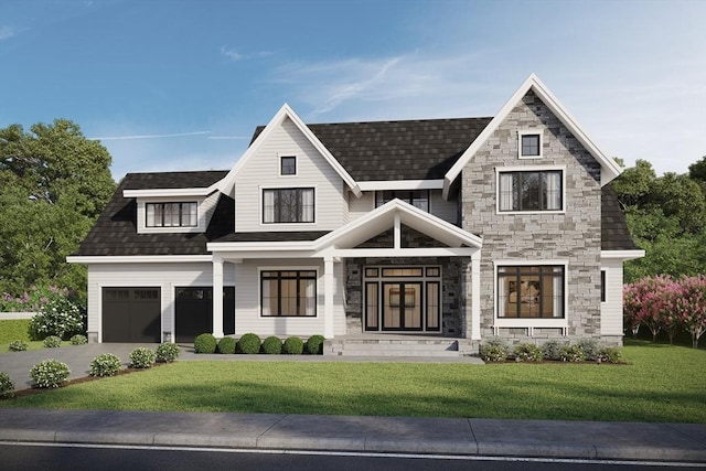 view of front of house with a garage and a front lawn