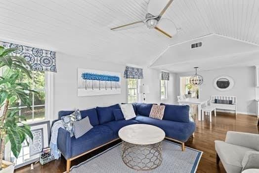 28 Christopher Ln, Scituate, MA 02066 - living room featuring wood finished floors, a ceiling fan, lofted ceiling, wood ceiling, and a chandelier