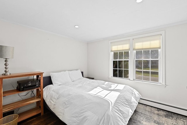28 Christopher Ln, Scituate, MA 02066 - bedroom with baseboard heating, crown molding, wood finished floors, and recessed lighting