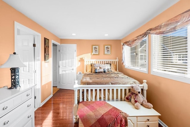 bedroom featuring dark hardwood / wood-style floors