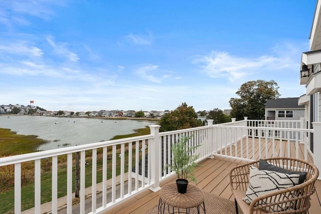 balcony featuring a water view