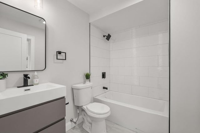 bathroom featuring baseboards, toilet, vanity, marble finish floor, and shower / bathtub combination