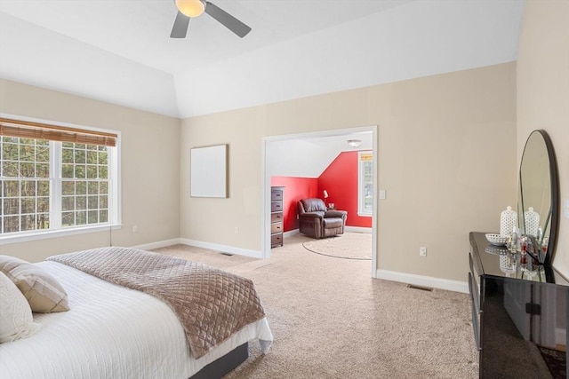 bedroom with baseboards, ceiling fan, carpet, and vaulted ceiling