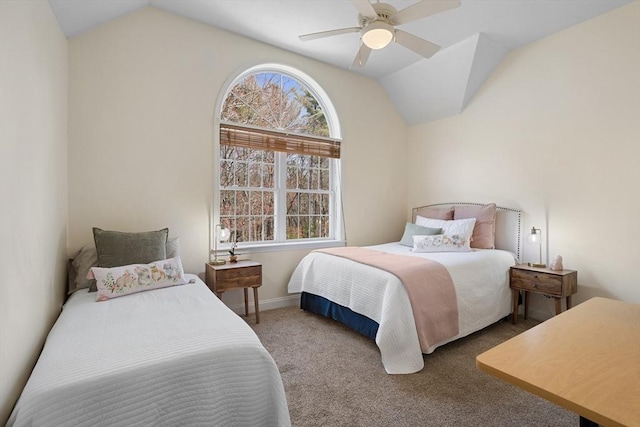 bedroom featuring baseboards, a ceiling fan, vaulted ceiling, and carpet flooring