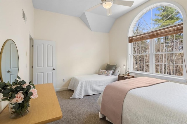 bedroom featuring baseboards, carpet, ceiling fan, and lofted ceiling
