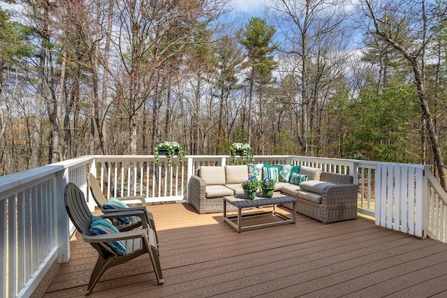 wooden deck featuring an outdoor hangout area