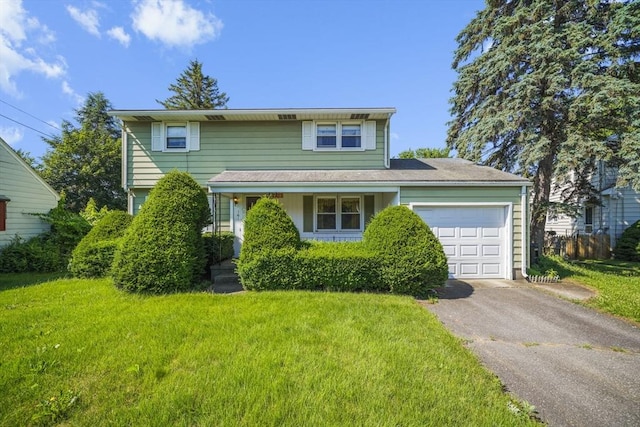 161 Columba St, Chicopee, MA 01020 - traditional home featuring an attached garage, a front yard, and driveway