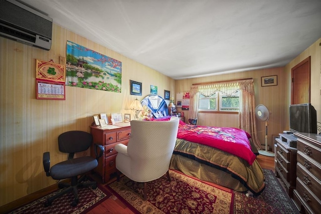 161 Columba St, Chicopee, MA 01020 - bedroom with a wall unit AC, wood finished floors, and wood walls