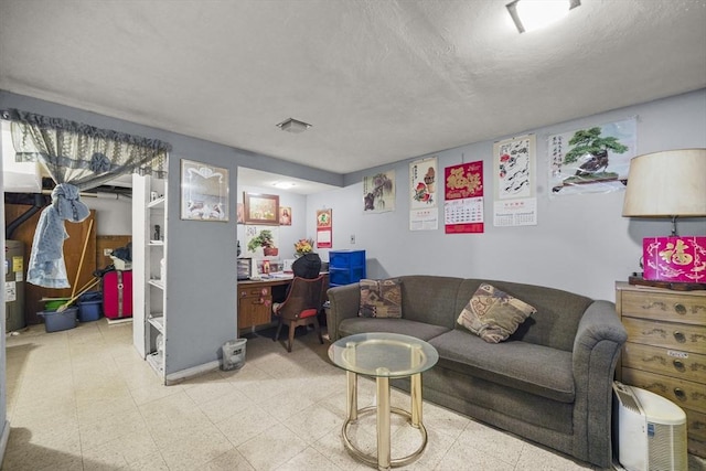 161 Columba St, Chicopee, MA 01020 - living room with tile patterned floors, a textured ceiling, and an office area