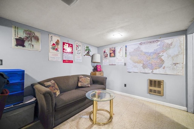 161 Columba St, Chicopee, MA 01020 - living room featuring heating unit and tile patterned floors