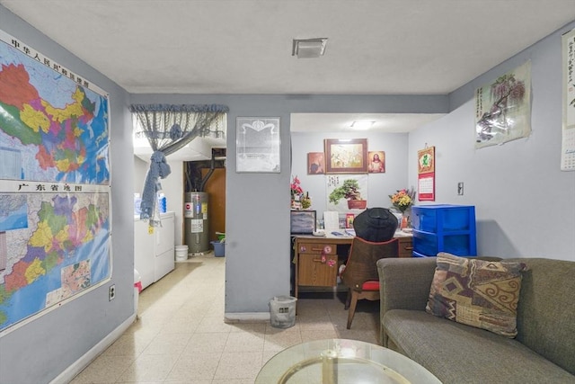 161 Columba St, Chicopee, MA 01020 - living room with separate washer and dryer and water heater