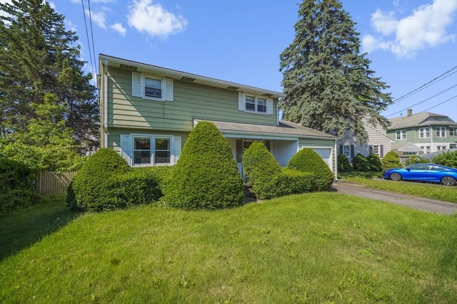 161 Columba St, Chicopee, MA 01020 - view of front facade featuring a garage and asphalt driveway
