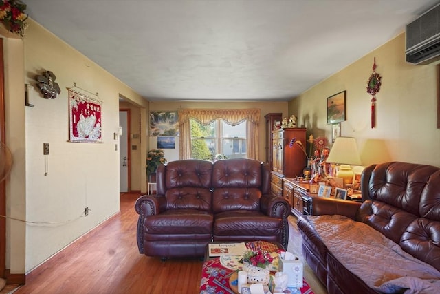 161 Columba St, Chicopee, MA 01020 - living area featuring wood finished floors and an AC wall unit