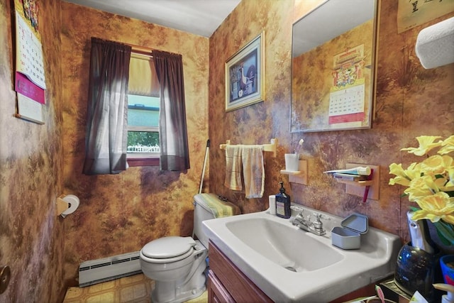 161 Columba St, Chicopee, MA 01020 - half bath featuring a baseboard heating unit and vanity
