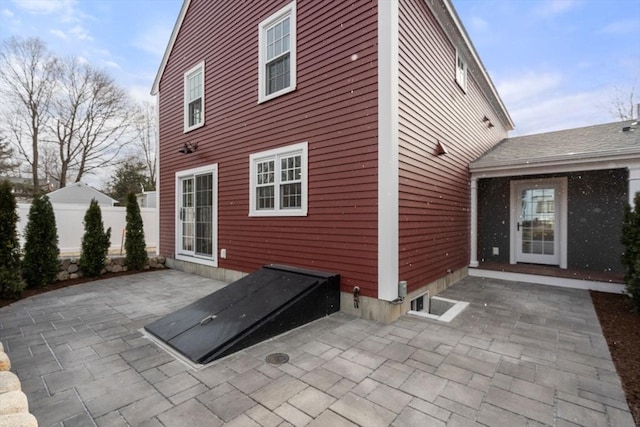 rear view of house with a patio