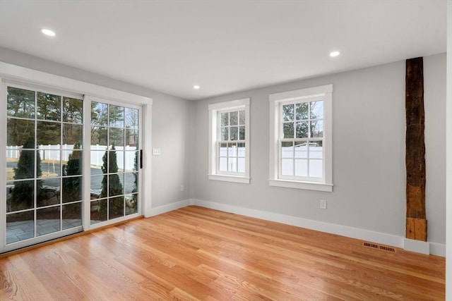 empty room featuring light hardwood / wood-style flooring