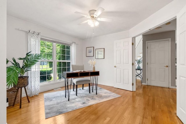 10 Gianna Dr, Saugus, MA 01906 - home office featuring light wood-style flooring and ceiling fan