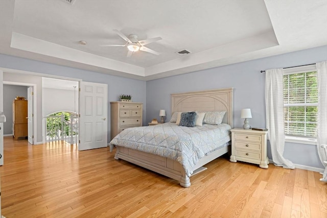 10 Gianna Dr, Saugus, MA 01906 - bedroom with a raised ceiling, light wood finished floors, and multiple windows