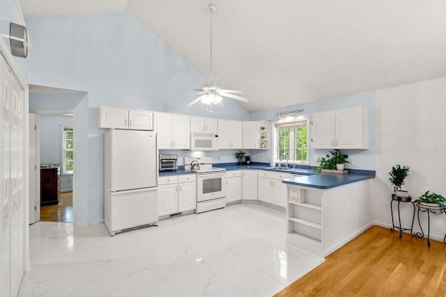 10 Gianna Dr, Saugus, MA 01906 - kitchen with open shelves, white appliances, dark countertops, white cabinets, and high vaulted ceiling