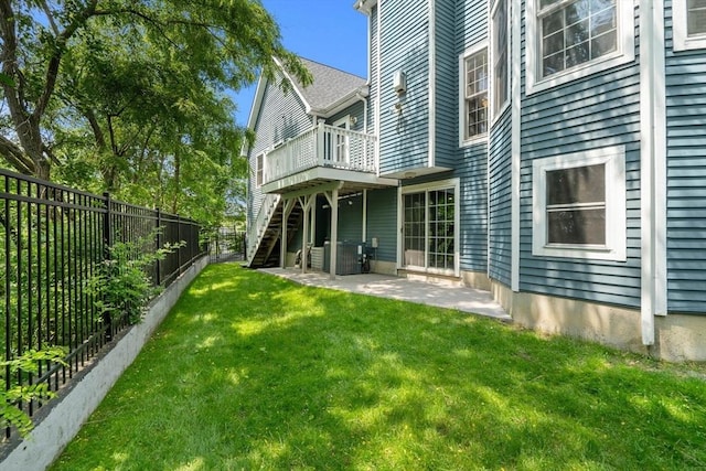 10 Gianna Dr, Saugus, MA 01906 - rear view of property featuring a fenced backyard, a patio, and stairs