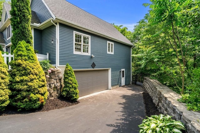 10 Gianna Dr, Saugus, MA 01906 - view of property exterior with a shingled roof and asphalt driveway