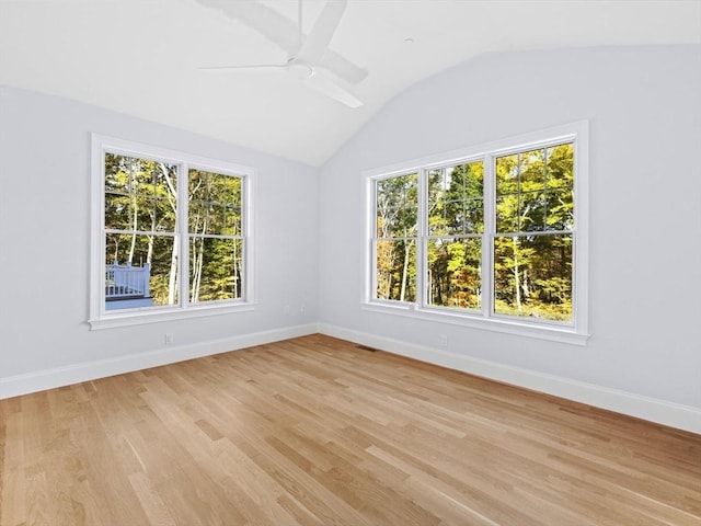 35 Lincoln St, Hopkinton, MA 01748 - unfurnished room featuring healthy amount of natural light, vaulted ceiling, light wood-style flooring, and a ceiling fan