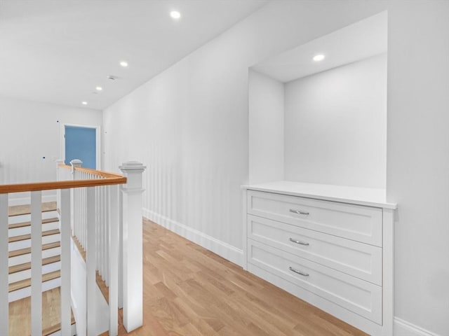 35 Lincoln St, Hopkinton, MA 01748 - hall with an upstairs landing, light wood finished floors, and recessed lighting