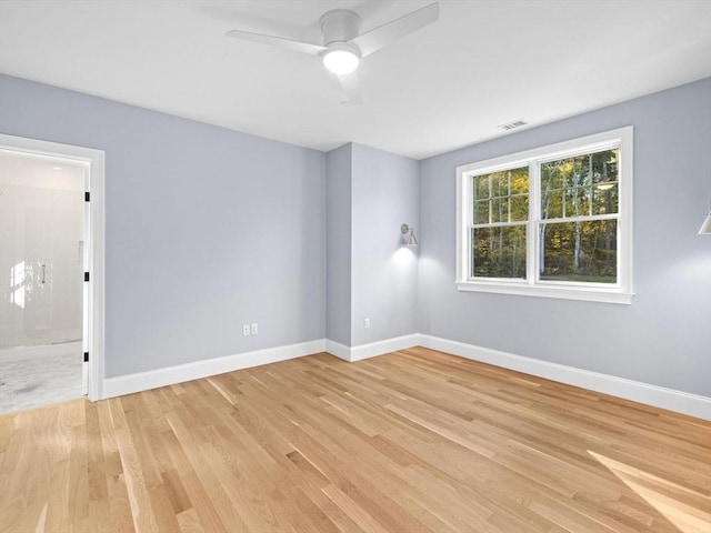 35 Lincoln St, Hopkinton, MA 01748 - spare room featuring light wood-type flooring and ceiling fan
