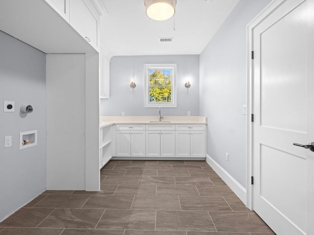 35 Lincoln St, Hopkinton, MA 01748 - laundry area with cabinet space, washer hookup, and electric dryer hookup