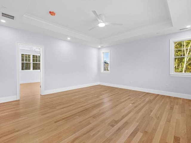 35 Lincoln St, Hopkinton, MA 01748 - empty room with a tray ceiling, ornamental molding, light wood-style floors, a ceiling fan, and recessed lighting