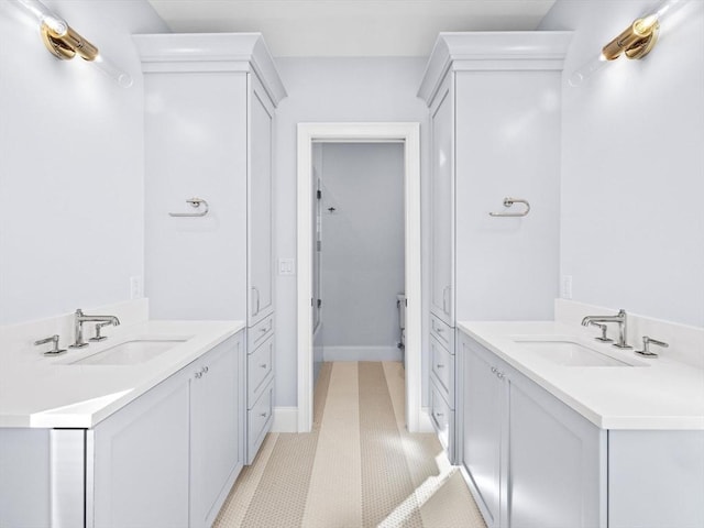 35 Lincoln St, Hopkinton, MA 01748 - full bathroom with two vanities and tile patterned floors