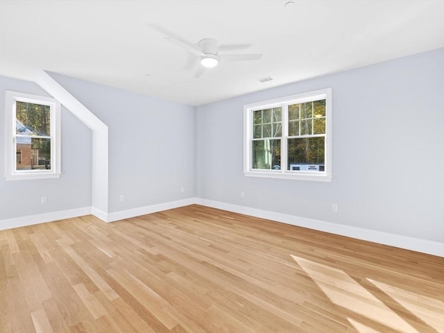 35 Lincoln St, Hopkinton, MA 01748 - spare room with healthy amount of natural light, light wood-style floors, and a ceiling fan