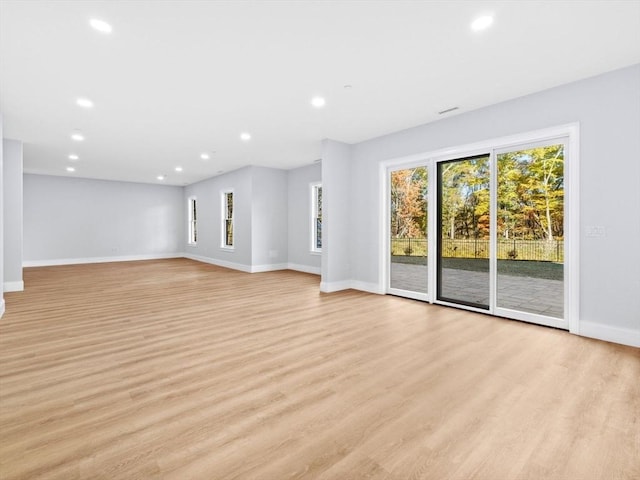 35 Lincoln St, Hopkinton, MA 01748 - unfurnished living room with recessed lighting and light wood-style floors