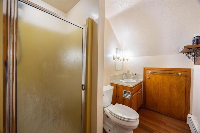 bathroom with a baseboard heating unit, a stall shower, toilet, wood finished floors, and vanity