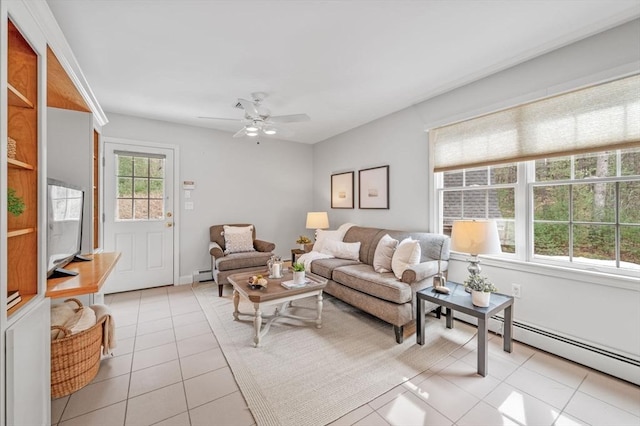 living room with ceiling fan, a baseboard radiator, and light tile patterned flooring