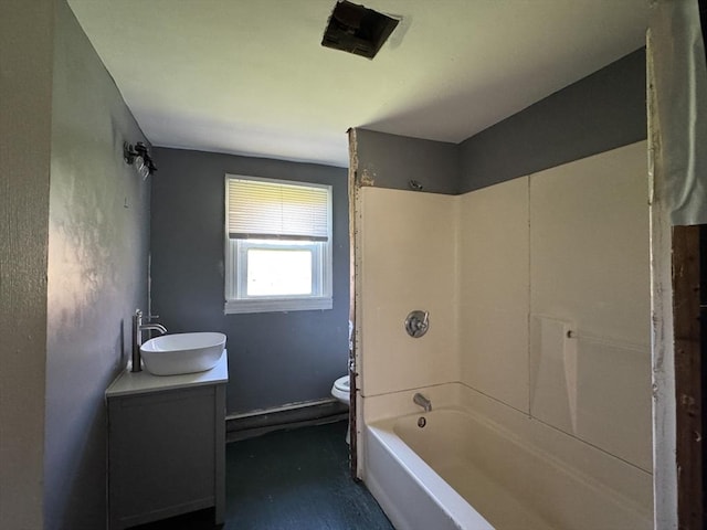 full bathroom with toilet, vanity, and washtub / shower combination