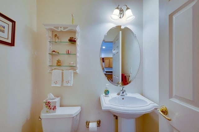 bathroom featuring toilet