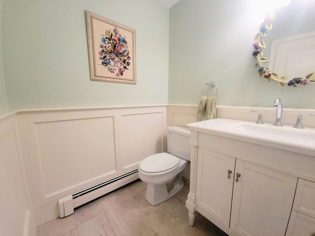 30 Ridgewood Ln, Quincy, MA 02169 - bathroom with a baseboard heating unit, vanity, a decorative wall, and wainscoting