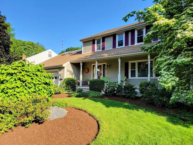 30 Ridgewood Ln, Quincy, MA 02169 - view of front facade with a front yard and a porch