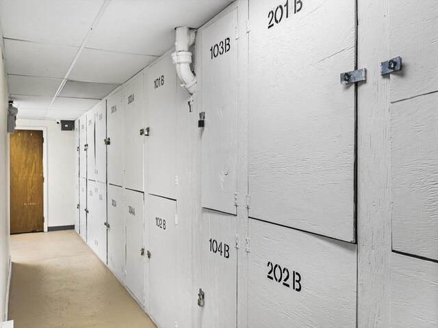382 Great Rd Unit B103, Acton, MA 01720 - hallway featuring concrete flooring and a drop ceiling