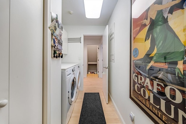 23 Matt Hoxie Trl Unit 23, Plymouth, MA 02360 - laundry area with washing machine and clothes dryer, light wood-style floors, and baseboards